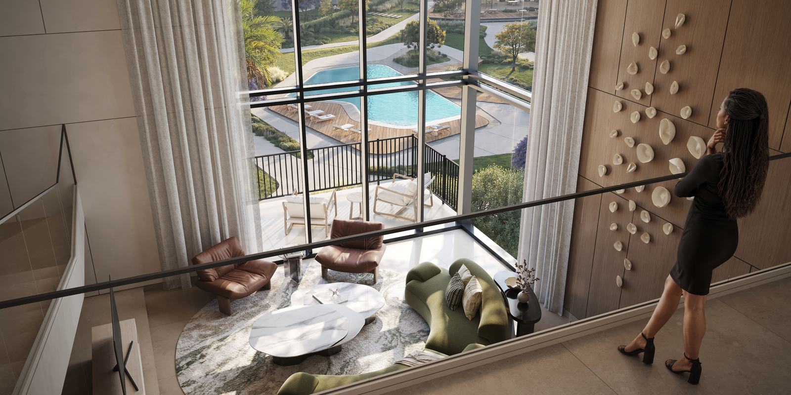 Double-height living room opening onto the landscape